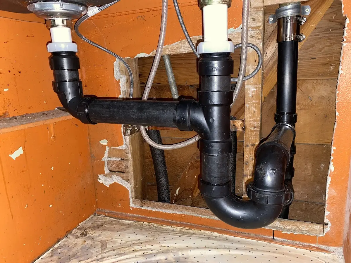 Professional Garbage Disposal Repair equipment and tools on the job in Whetstone